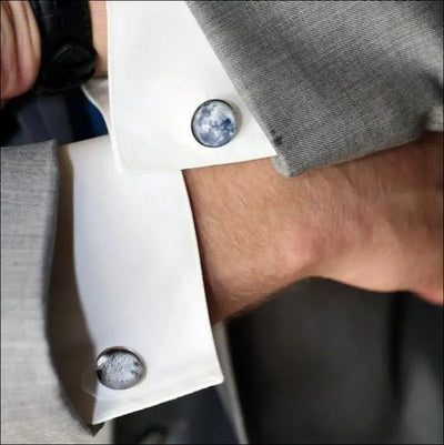 Dark Side of the Moon cuff links with bronze or silver tone on white French cuffs.